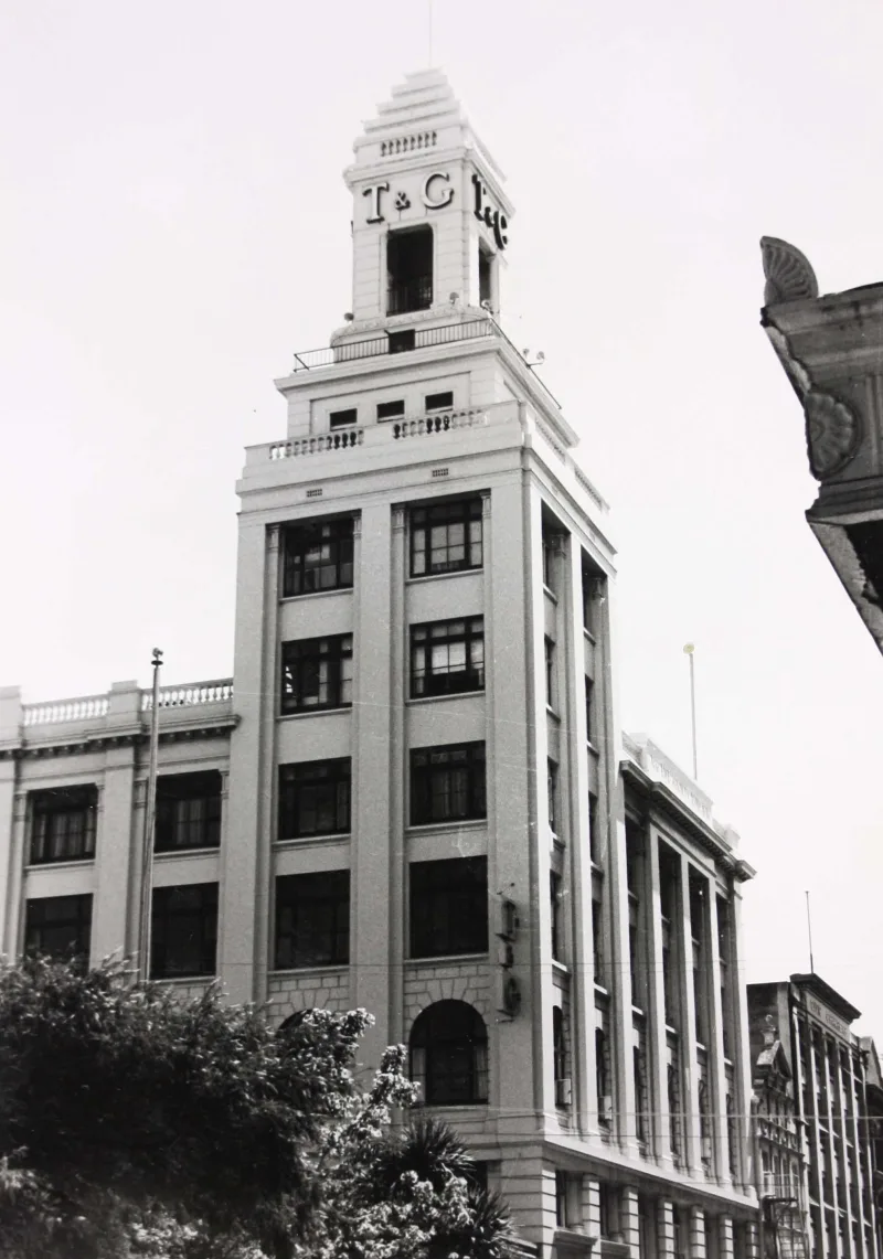 Black and white photo of a building from the street