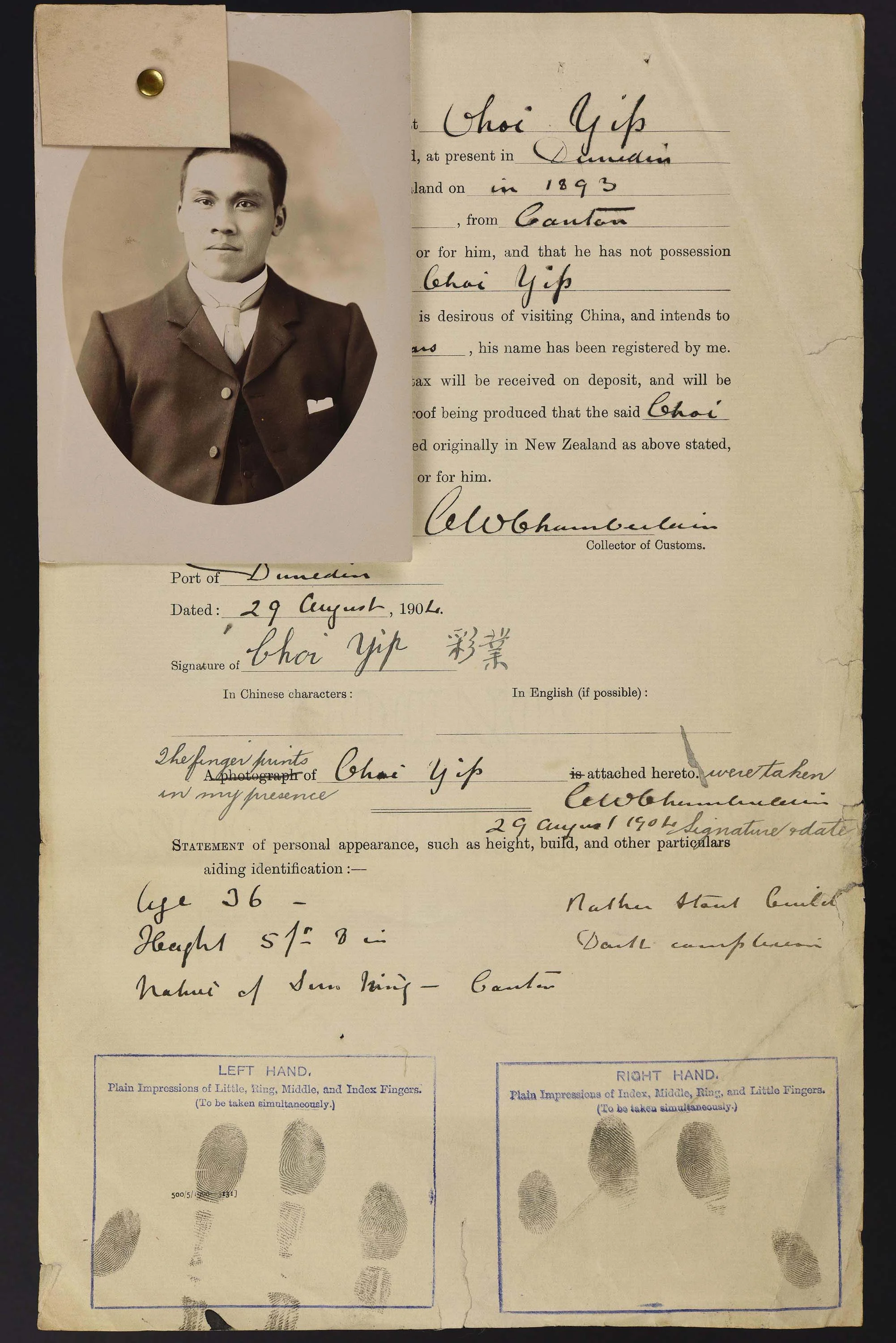 Sepia photo portrait of a Chinese man pinned to his immigration papers