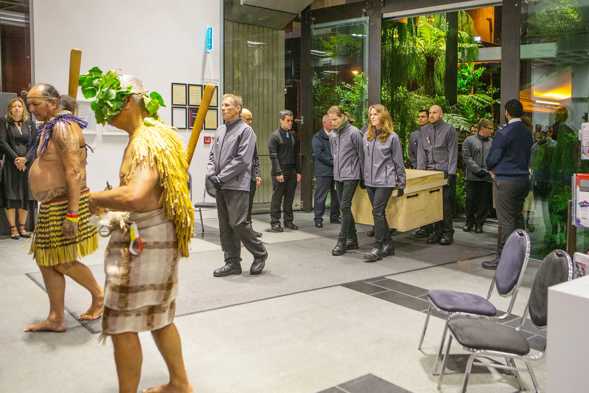 Archives NZ staff led by Ngā Toa/Valiant warriors bringing the documents into their new home.
