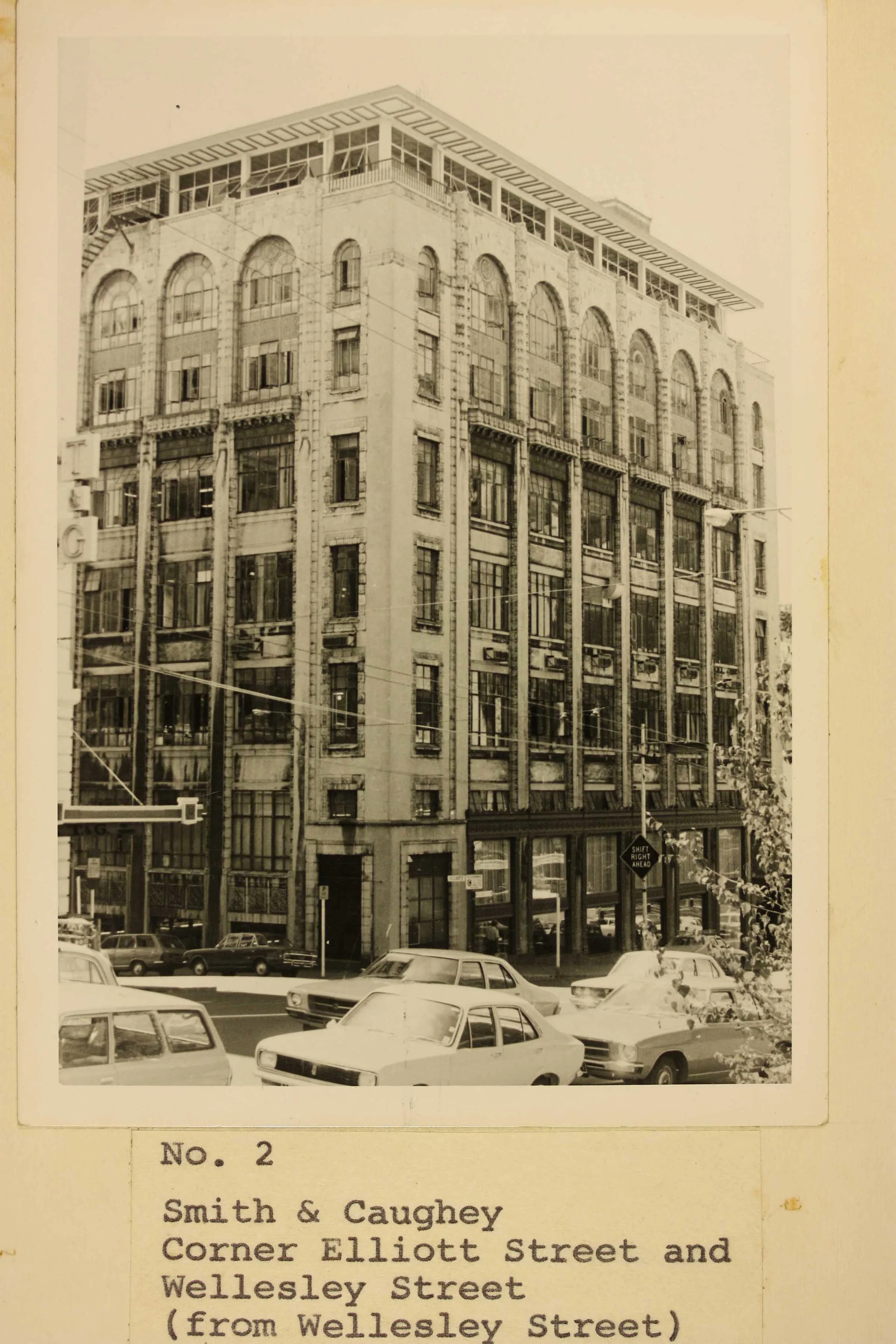 Sepia photo of a department store from the street