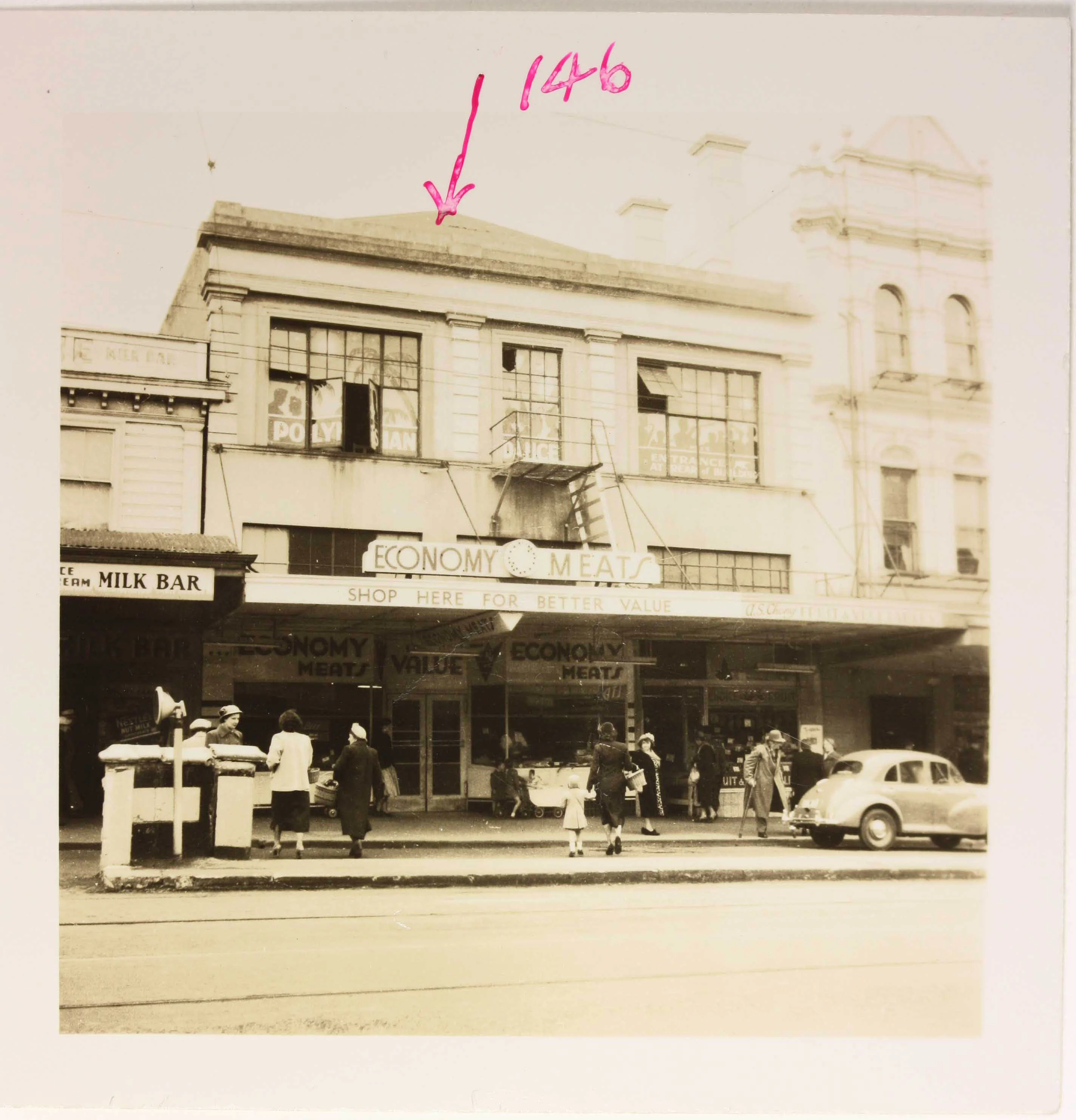 Sepia photo of a building from the street