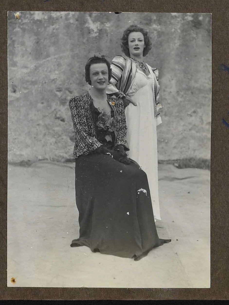 2 people dressed in drag.