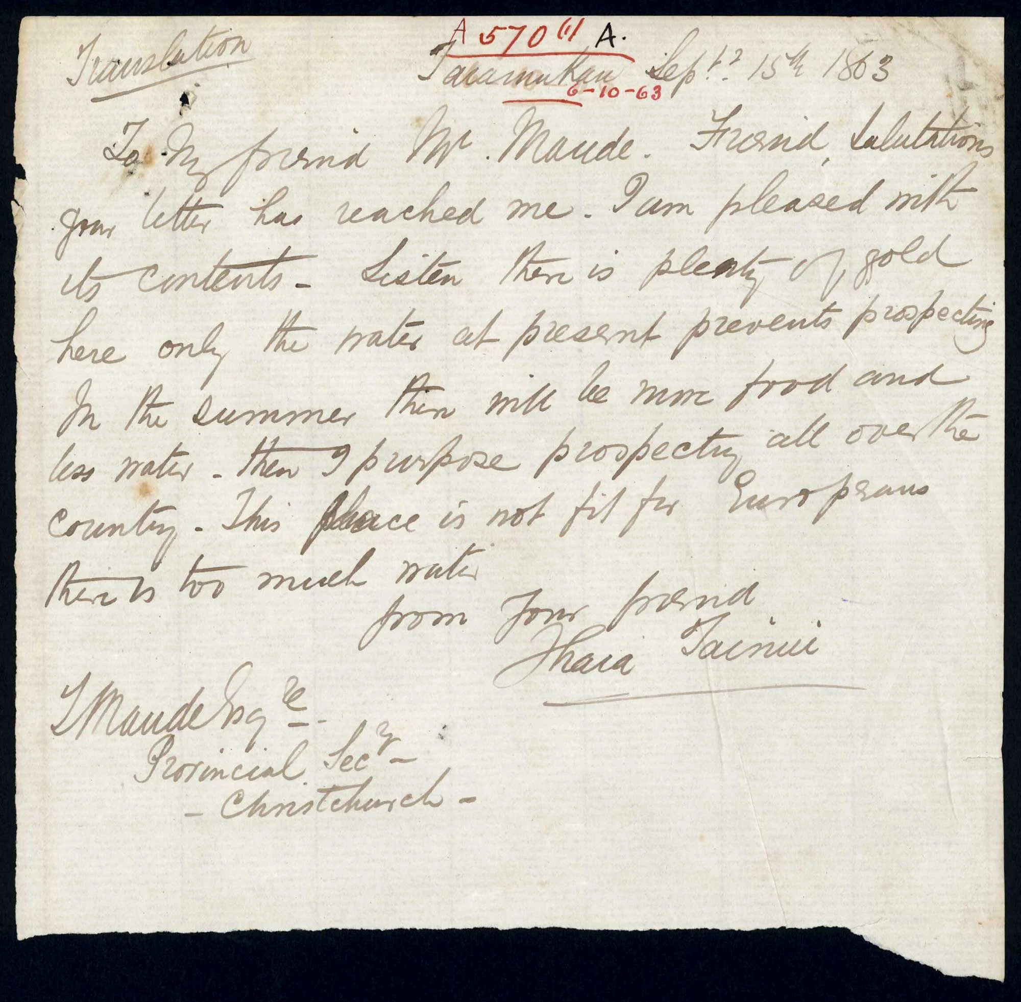 Handwritten text on an old yellowed paper