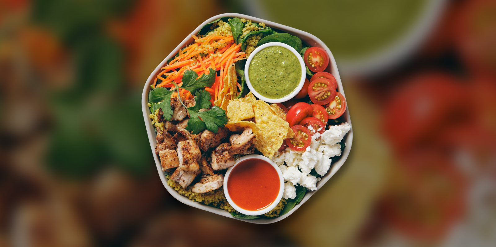Chicken Tostada bowl with blurred background of chicken tostada macro shot