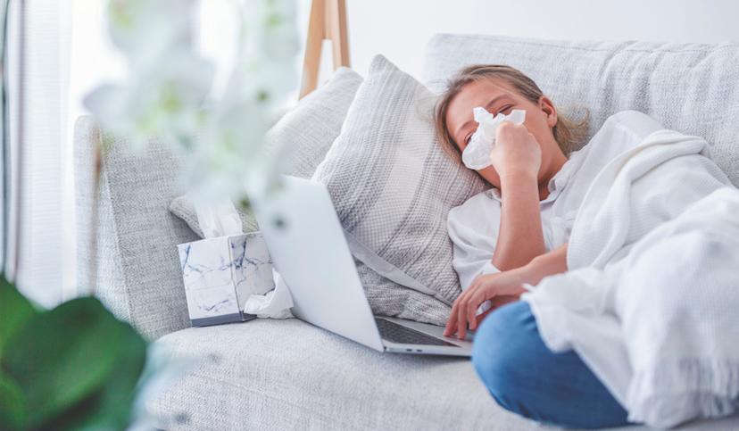 Sick woman on couch