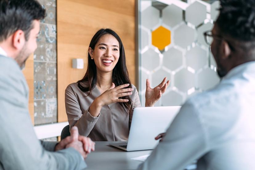 Workers discussing AI use
