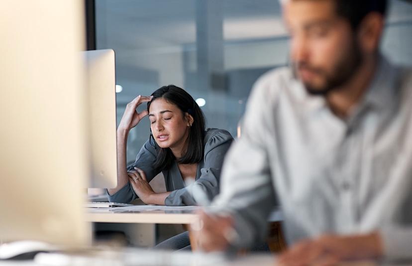 Woman struggling at work