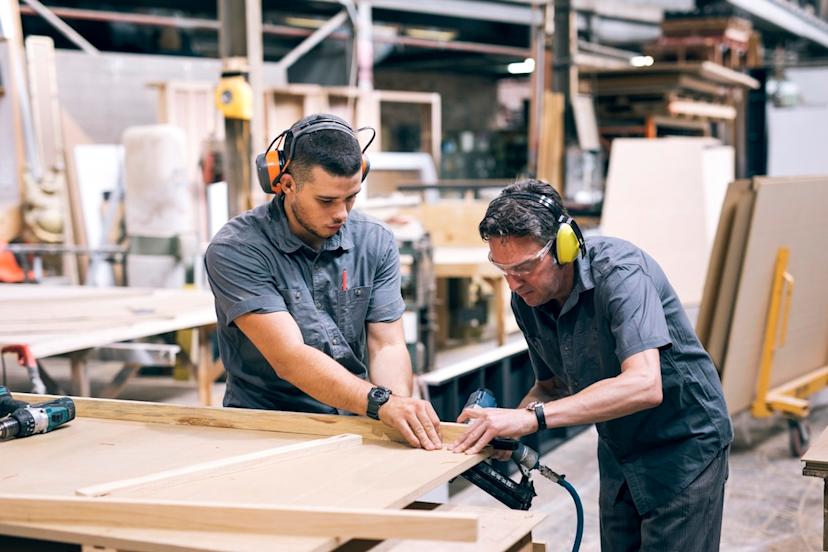 Employees working in a carpentry shop