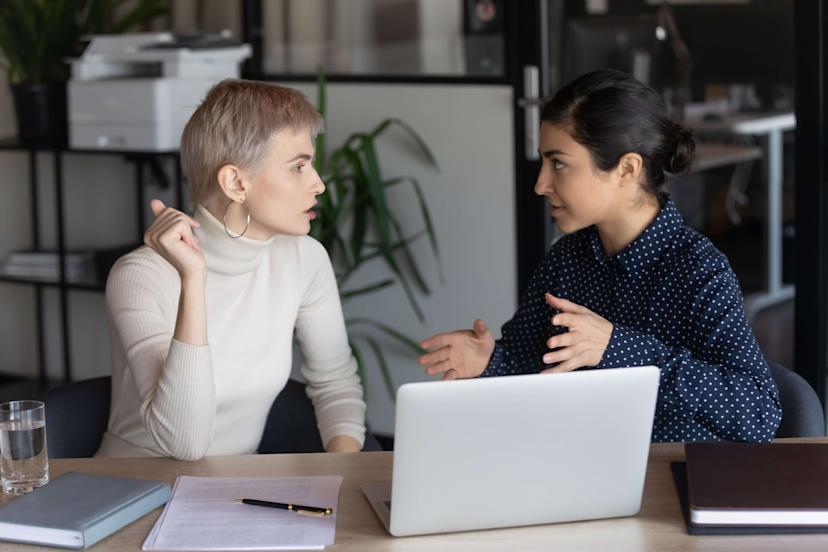 Performance review meeting between manager and employee