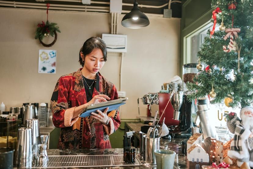 Worker in a cafe at Christmas time