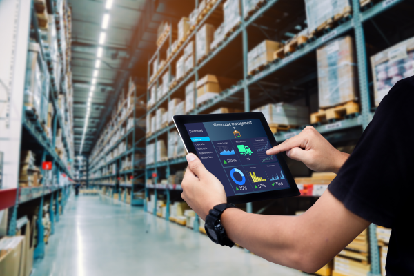 Warehouse worker using a tablet. 