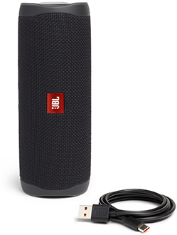 Vertical Black JBL Flip 5 Bluetooth Speaker Beside Charging Cable