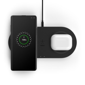 Top view of black Belkin BOOST↑CHARGE™ Dual Wireless Charging Pad 10W with devices
