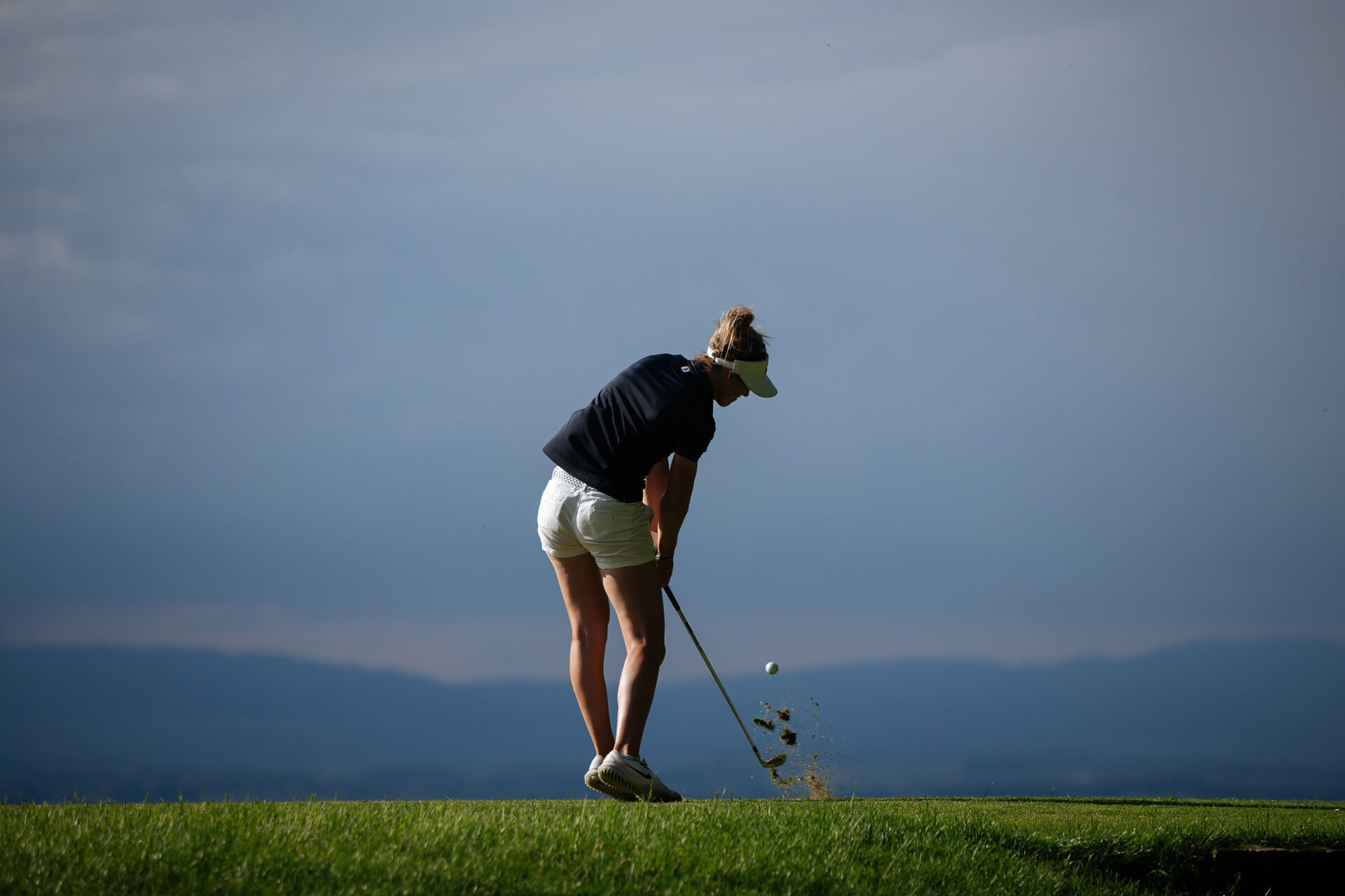 Woman playing golf