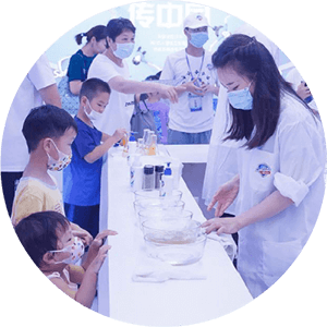 Asian woman wearing a mask doing chemical experiments