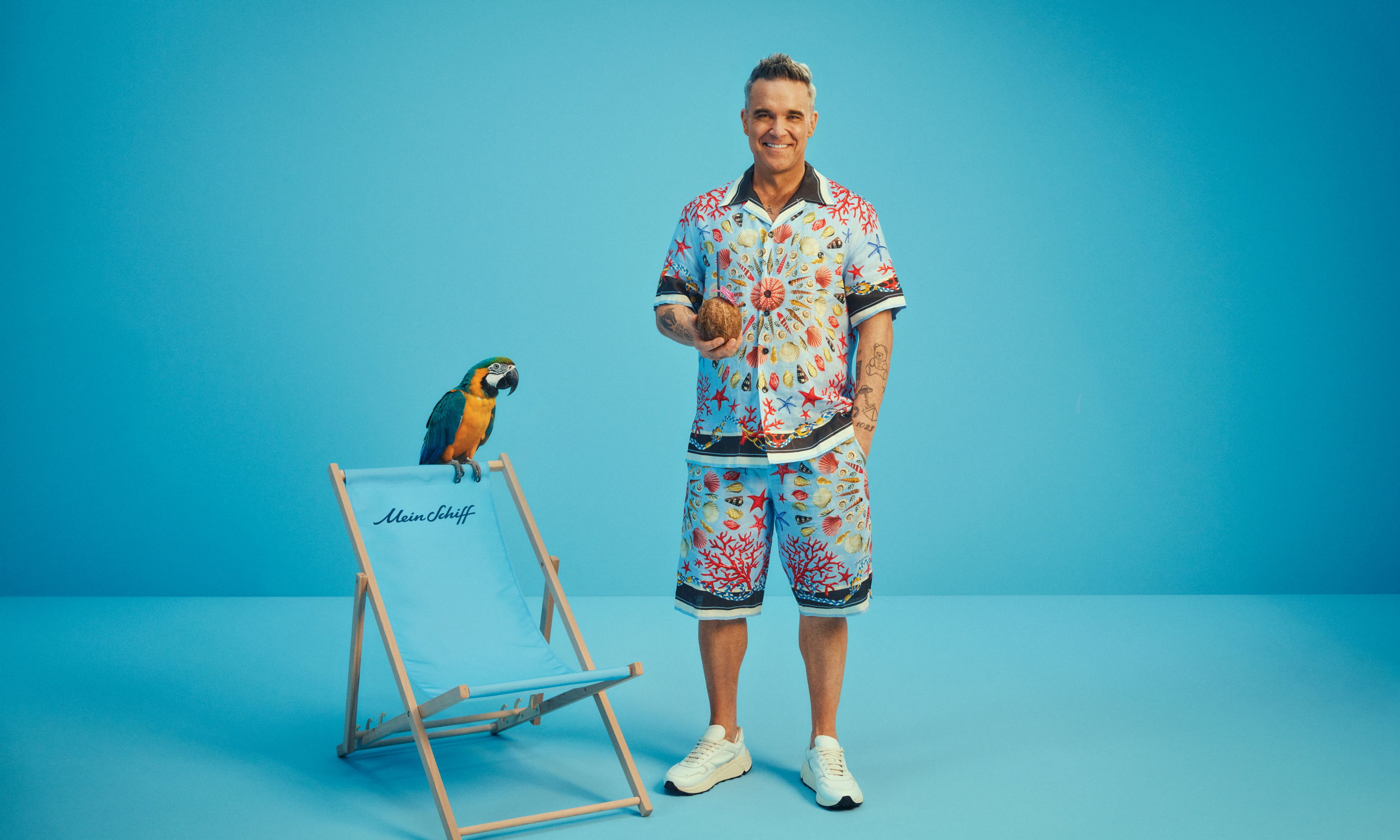 Robbie Williams- Papagei und Liegestuhl