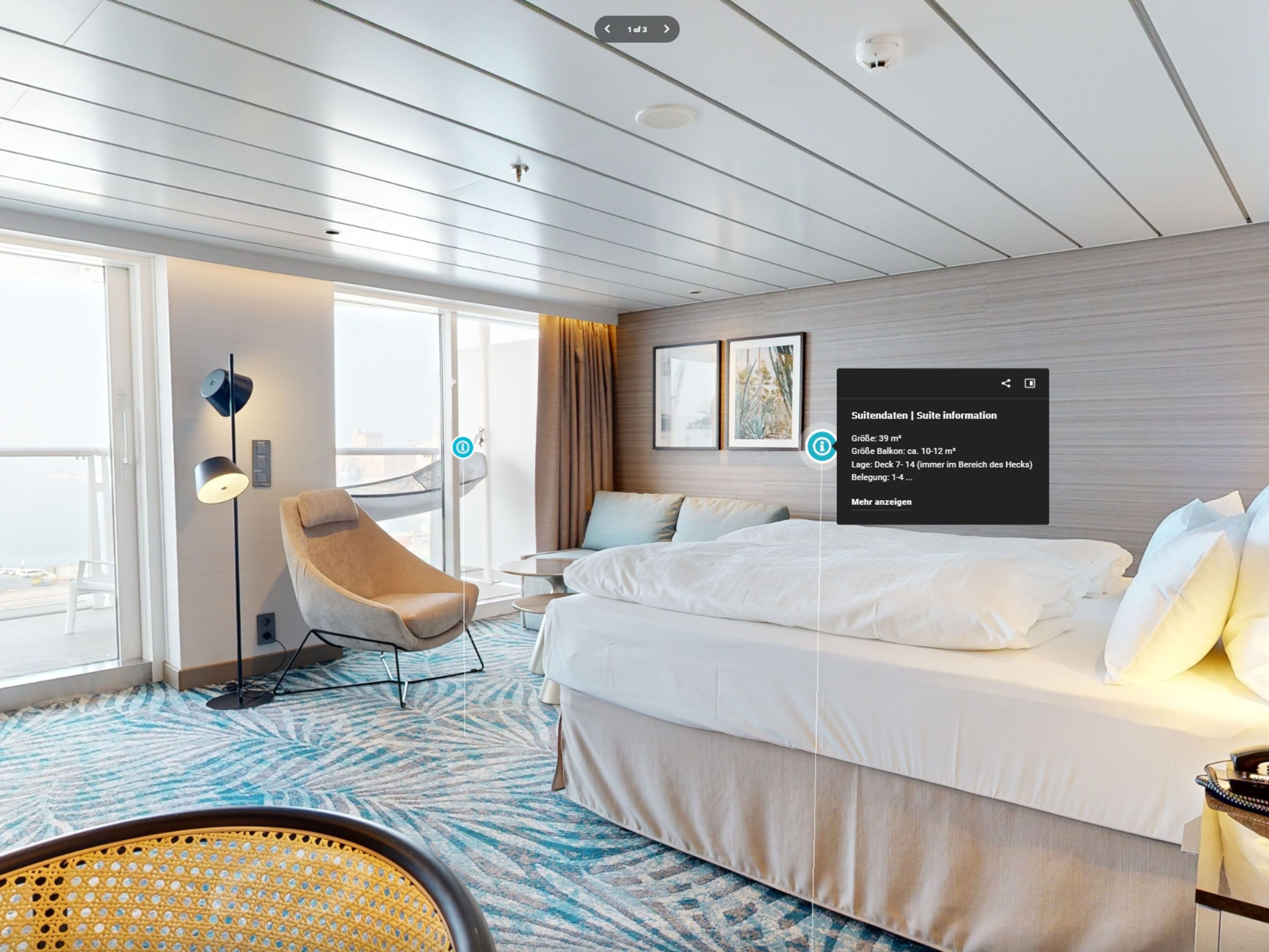 Helle Kreuzfahrtsuite mit Balkon, Bett, Sessel und Meerblick. Helle Kreuzfahrtsuite mit Balkon, Bett, Sessel und Meerblick.