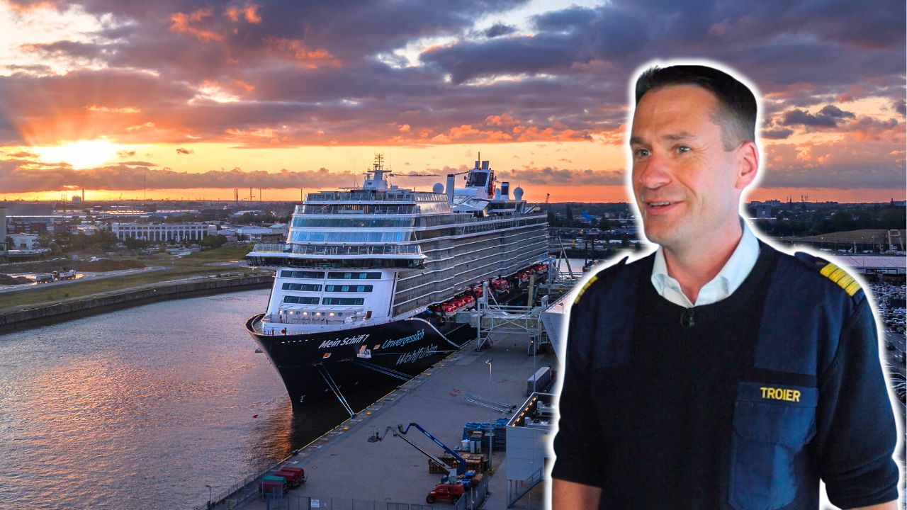 Kreuzfahrtschiff der Mein Schiff® Flotte bei Sonnenuntergang im Hafen, Kapitän im Vordergrund.