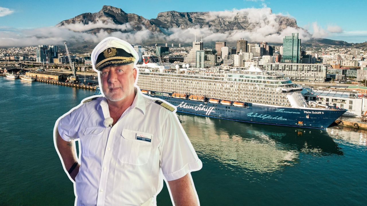 Kapitän vor Kreuzfahrtschiff der Mein Schiff® Flotte in Kapstadt.