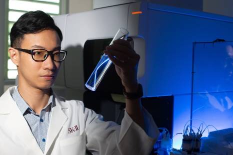 Scientist looking at a lab sample