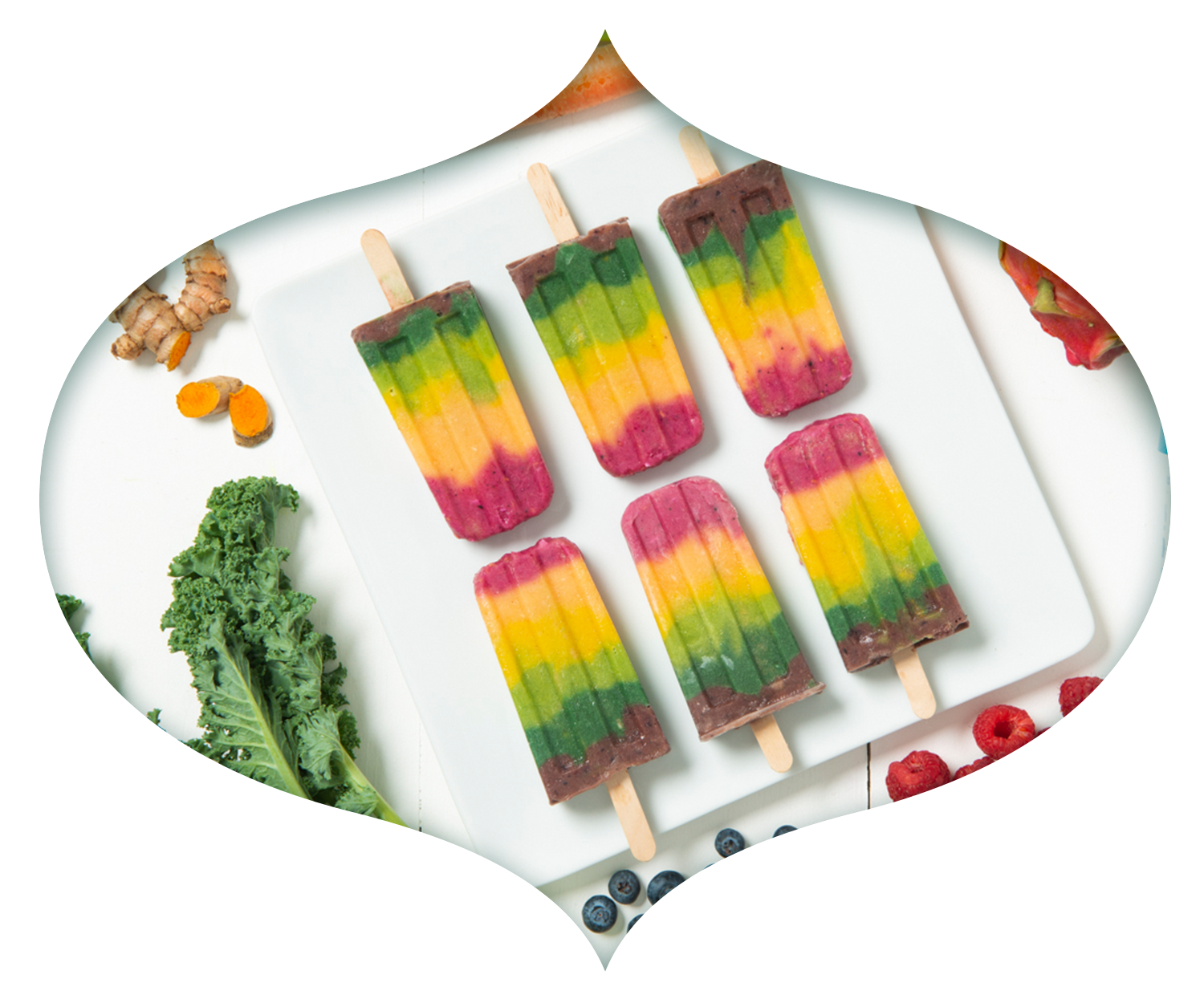 Rainbow popsicles made with Cosmic Bliss Infinite Coconut ice cream and other natural ingredients