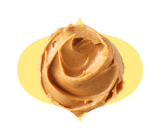Swirl of peanut butter in a bindi-shaped frame