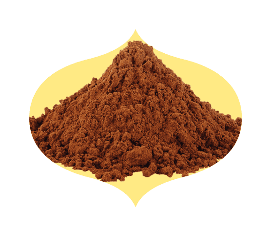 Pile of cocoa powder in a bindi-shaped frame