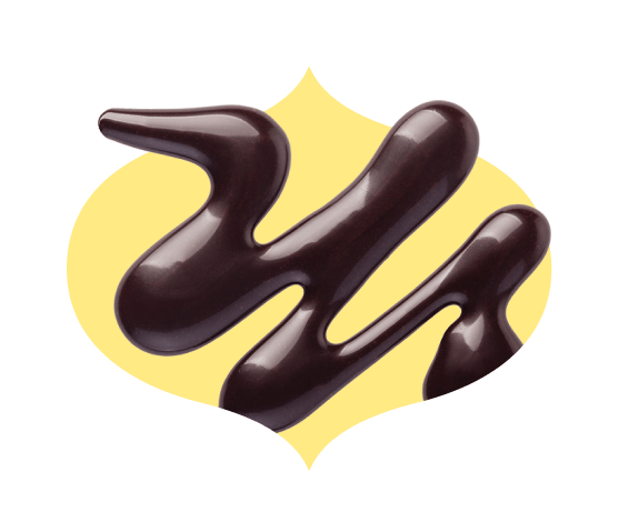 Swirl of chocolate syrup in a bindi-shaped frame