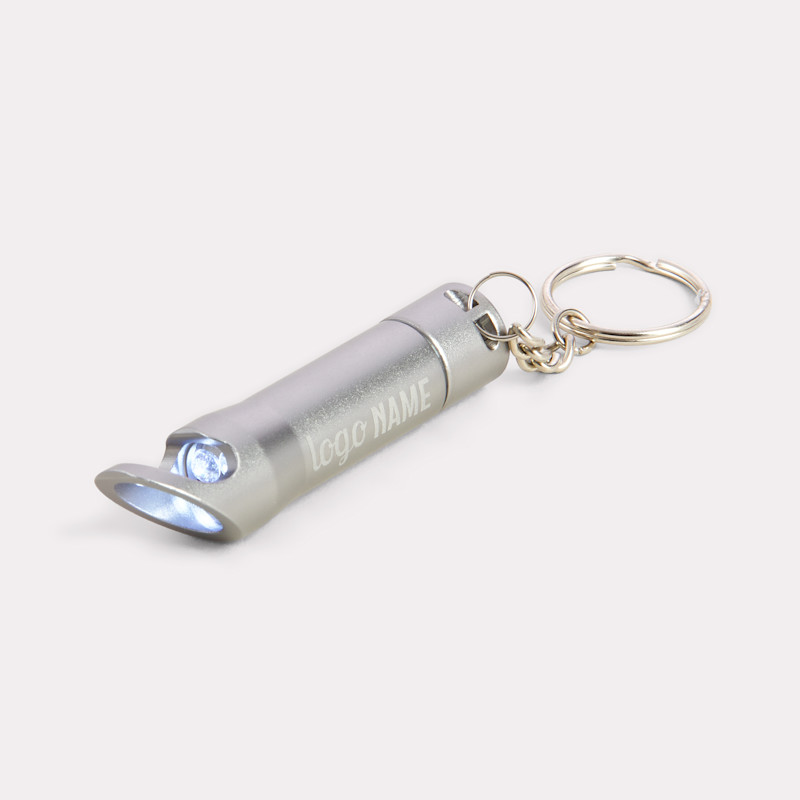 Porte-clé avec lampe et ouvre-bouteille