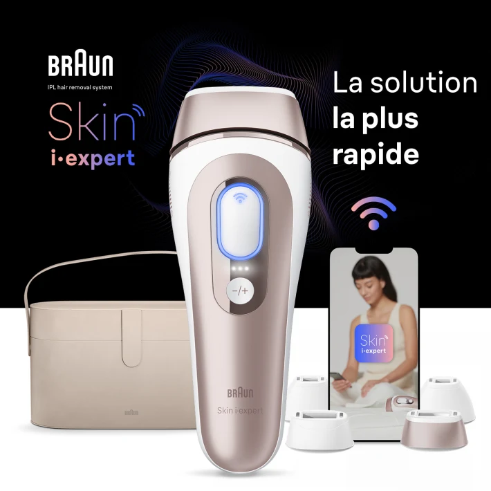 Épilateur à lumière pulsée au centre, derrière lui une pochette de vanity beige, un appareil mobile avec l'application Skin i·expert et quatre accessoires