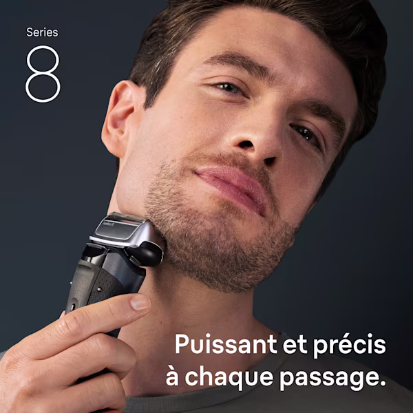 Homme se rasant avec un rasoir Series 8. Texte : Puissant et précis à chaque passage. Homme se rasant avec un rasoir Series 8. Texte : Puissant et précis à chaque passage.