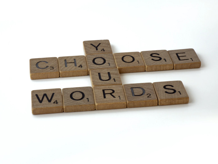 Word tiles spelling "Choose your Words"