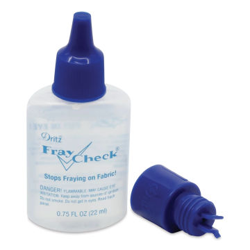 Dritz Fray Check Liquid Seam Sealant out of packaging with fabric guide applicator off