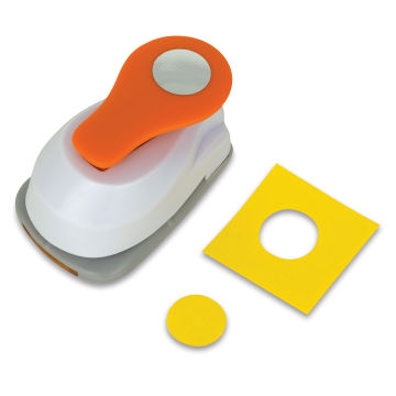 Fiskars Lever Punches - Punch shown next to small yellow circle and paper