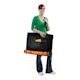 S2000 Softside Backpack Portfolio - Artist holding filled portfolio with shoulder strap