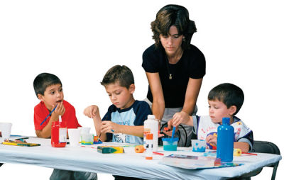 Kwik-Cover Tablecloths - Teacher and students painting on covered table
