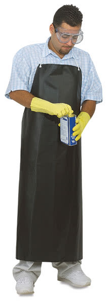 Black Hycar Studio Apron - Man standing in Apron carefully opening can