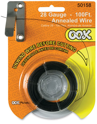 Ook Dark Annealed Specialty Wire - Front of 28-gauge wire package with wire fed into wire cutter