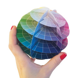 Kolormondo 3-D Color Wheel - Artist holding completed Color Wheel Globe
