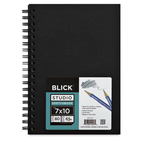 Black sketchbook, pencil, clips, Stock image