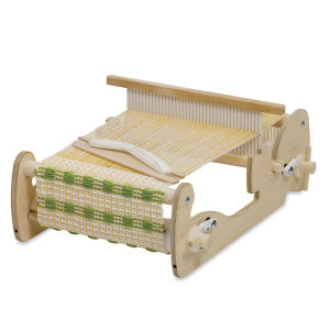 Schacht Cricket Loom - Right angled view of 10" wide loom showing woven fabric
