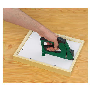 Fletcher FlexiMaster Framing Tool - Hand using tool to fire points into frame