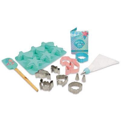 Handstand Kitchen Ultimate Baking Party Set - Under the Sea, bakeware and recipe book laid out. 
