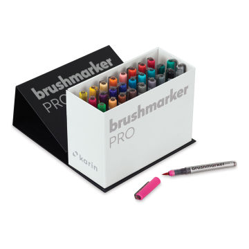 Karin Brushmarkers Pro Markers - Set of 27, storage box shown open with one open pink pen in front