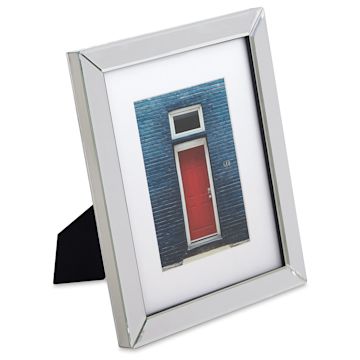 Open in modal - Umbra Mirror Frame - Angled view of 8" x 10" frame with 5" x 7" mat showing easel back