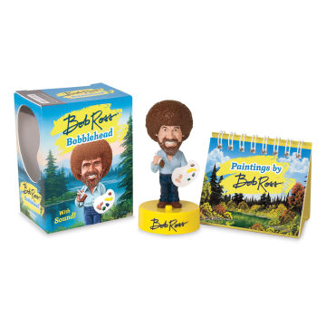 Bob Ross Bobblehead shown between packaging and included mini easel picture book