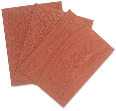 Mayco Designer Clay Mats - Wood Grain, Retro Squares and Swirl mats shown in fan