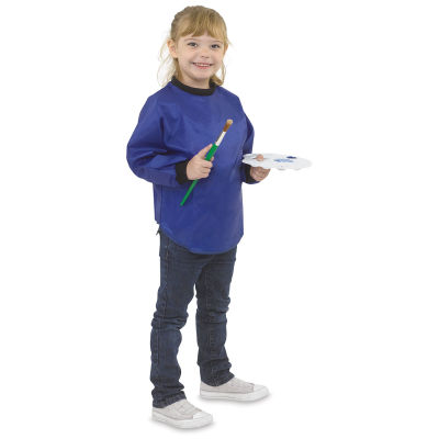 Kids’ Waterproof Smock - Child wearing smock and holding brush and palette