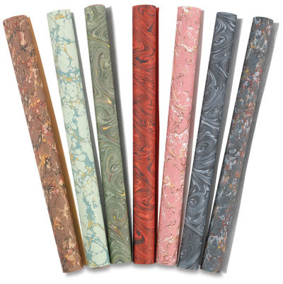 Books by Hand Marbled Papers - Several patterned paper sheets shown rolled