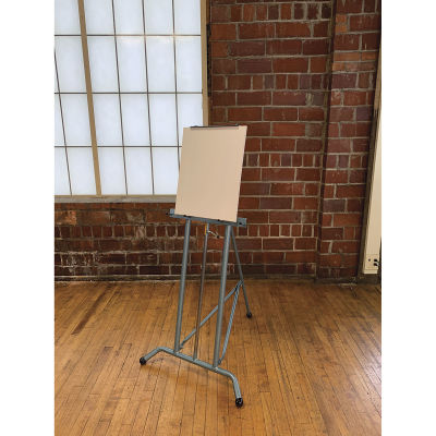 Klopfenstein PE 101 Steel Art Easel - Angled view of Easel shown in studio and holding canvas
